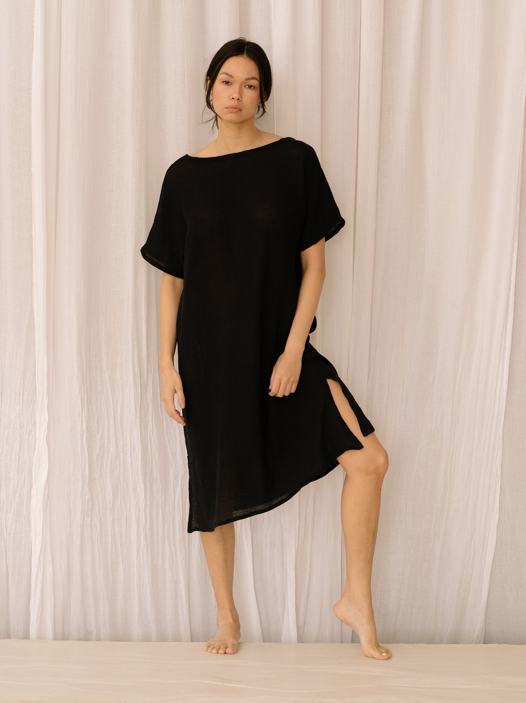 Asya black resort dress with side splits.