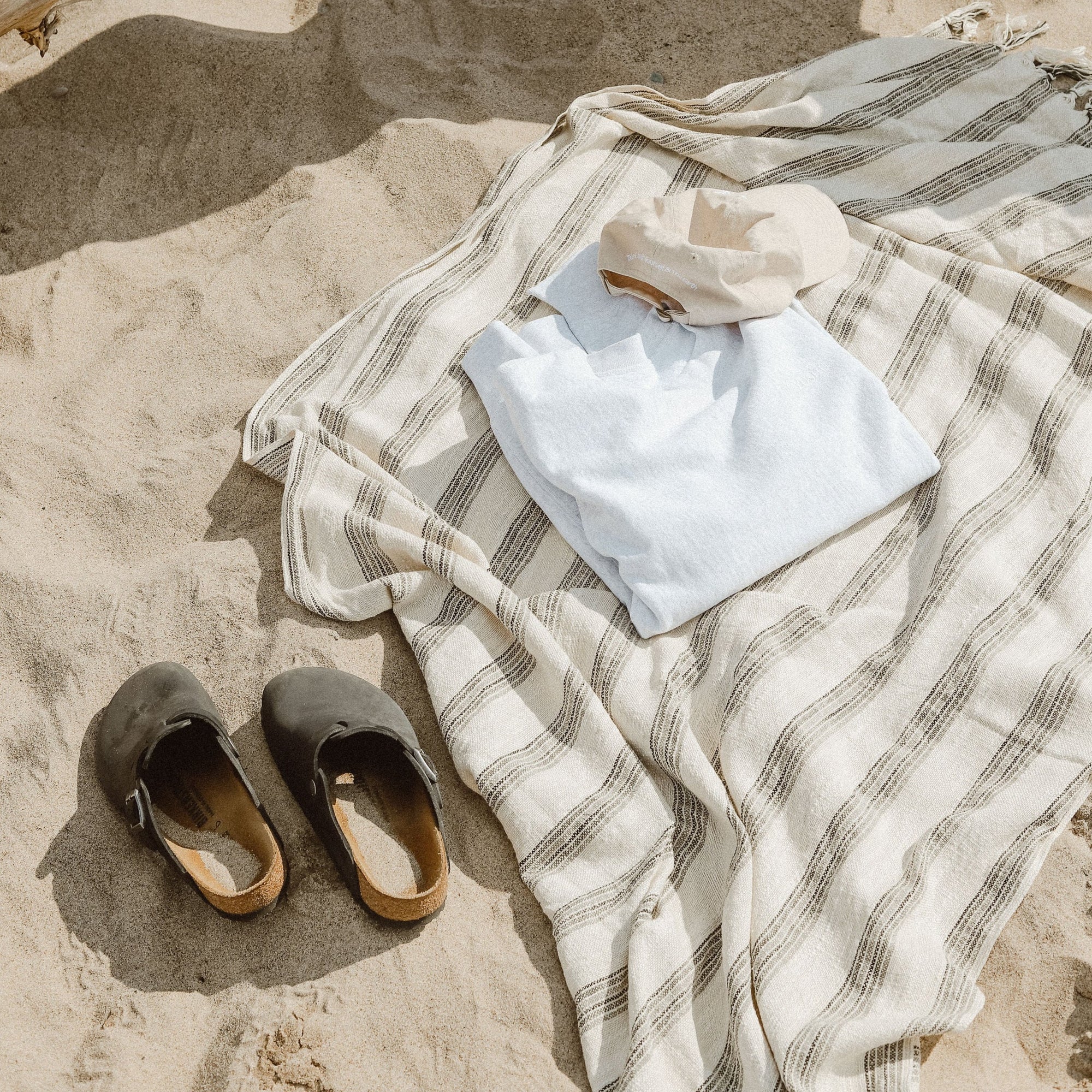 Maya handwoven Turkish towel as a beach towel.