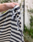 Asos handwoven cotton Turkish towel with cream and black stripes.
