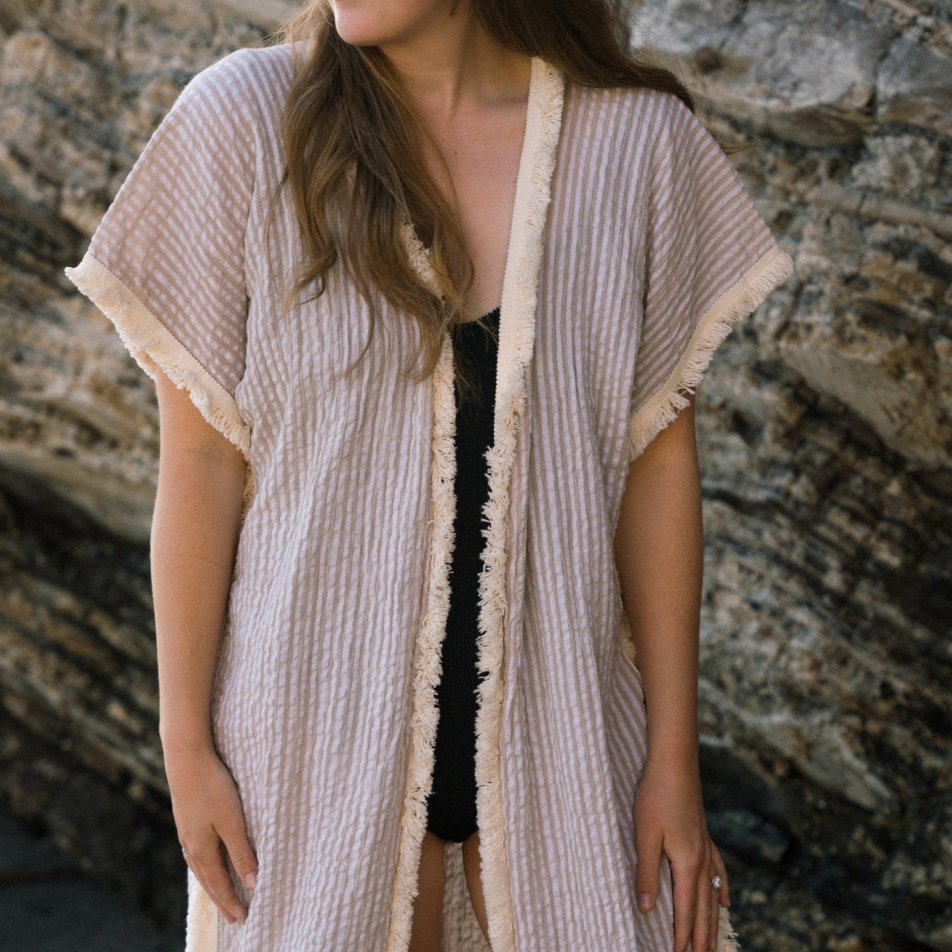 Handwoven Lydia Kaftan as a beach cover-up.