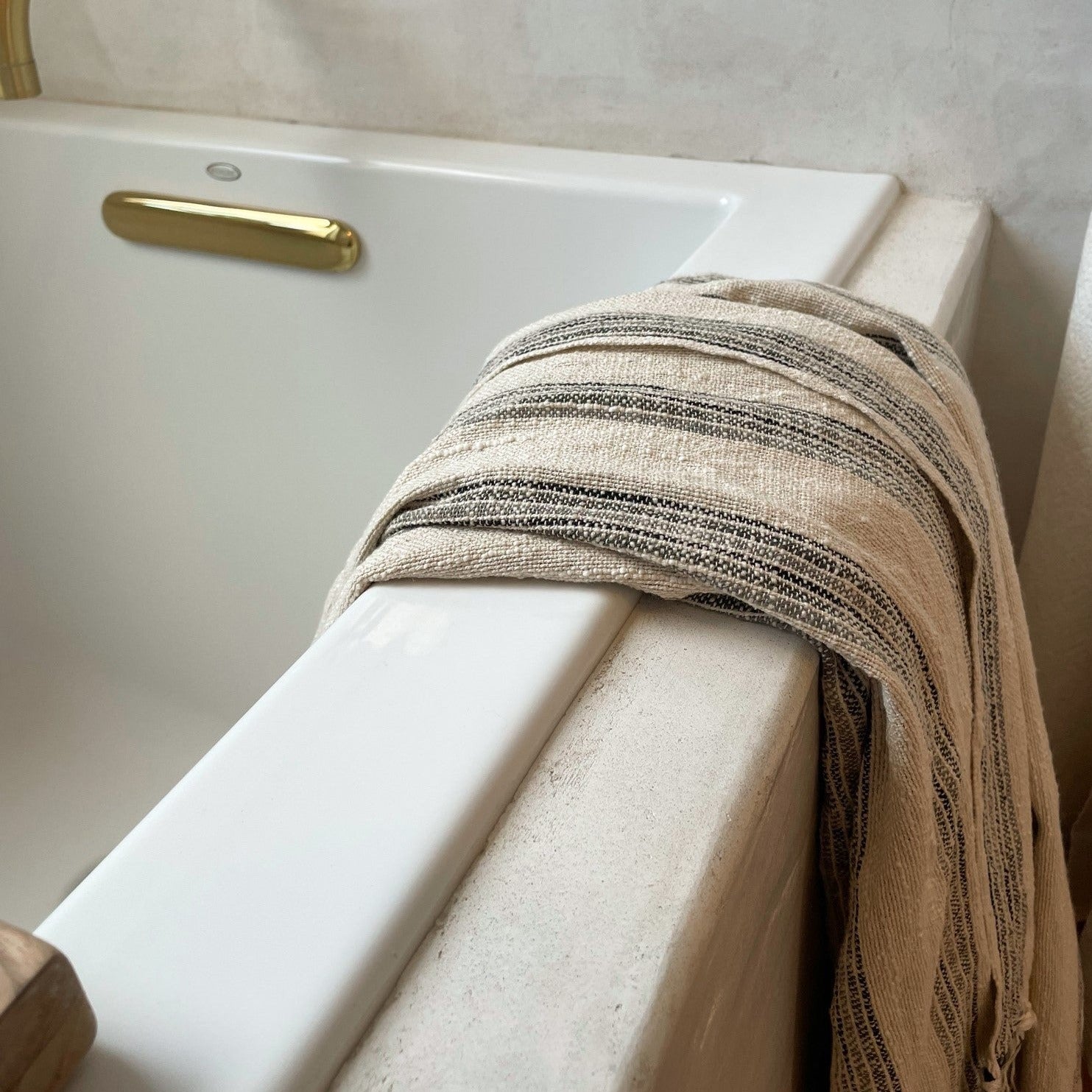 Cotton linen blend handwoven Turkish towel with gray stripes.