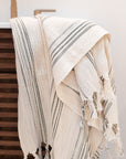 Cotton linen blend Turkish towel with gray thin stripes.