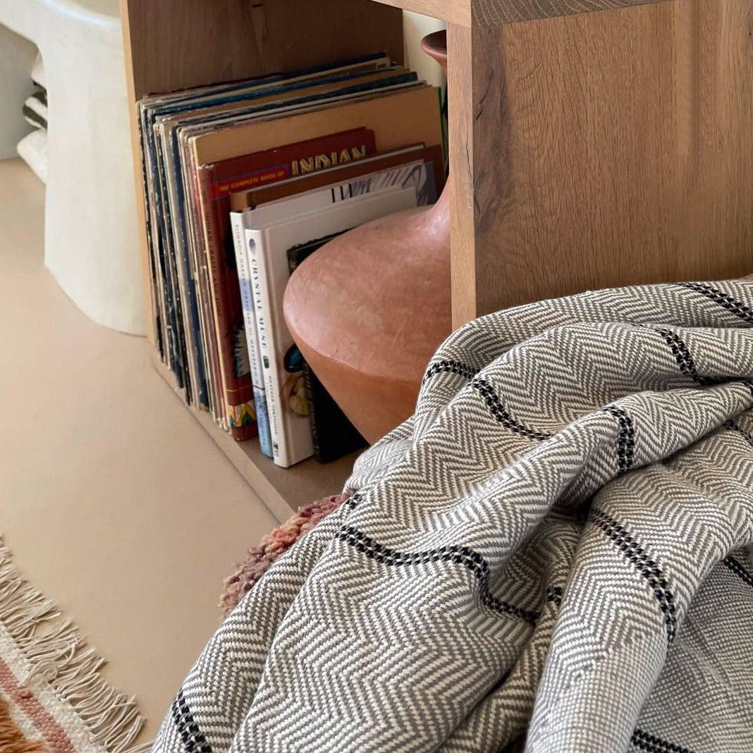 Cotton Turkish throw towel with herringbone pattern.