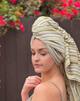 Premium handwoven Turkish towel with green stripes.