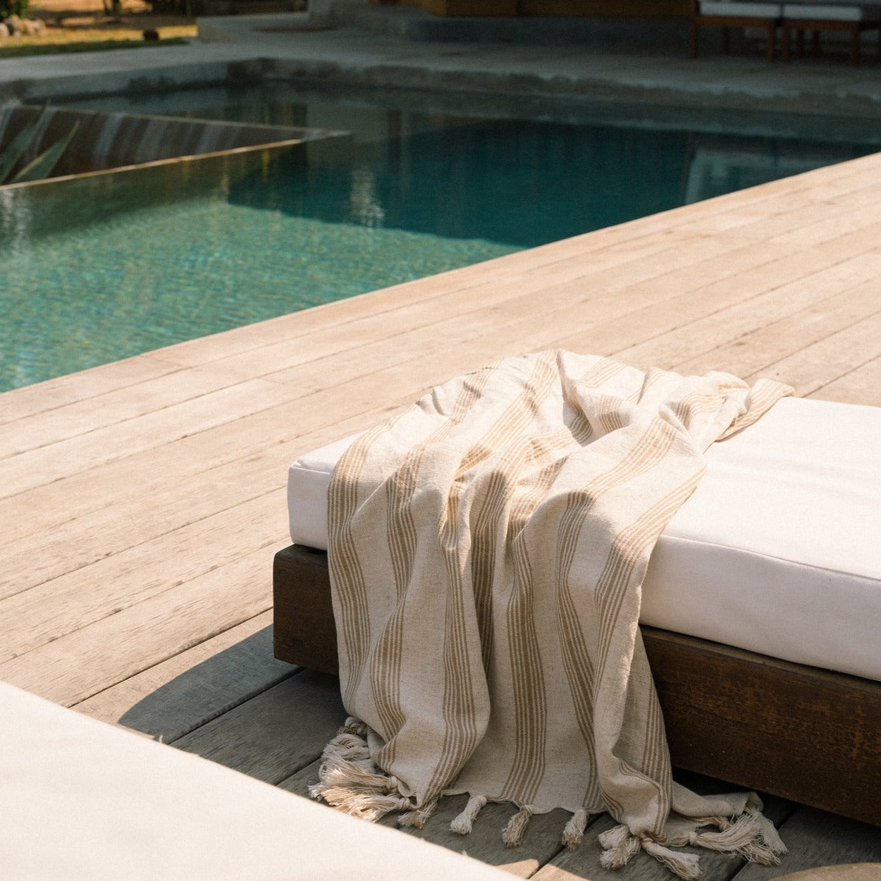 Sade Turkish towel by the pool.