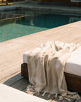 Sade Turkish towel by the pool.