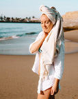 Kumsal handwoven Turkish towel as a hair towel.