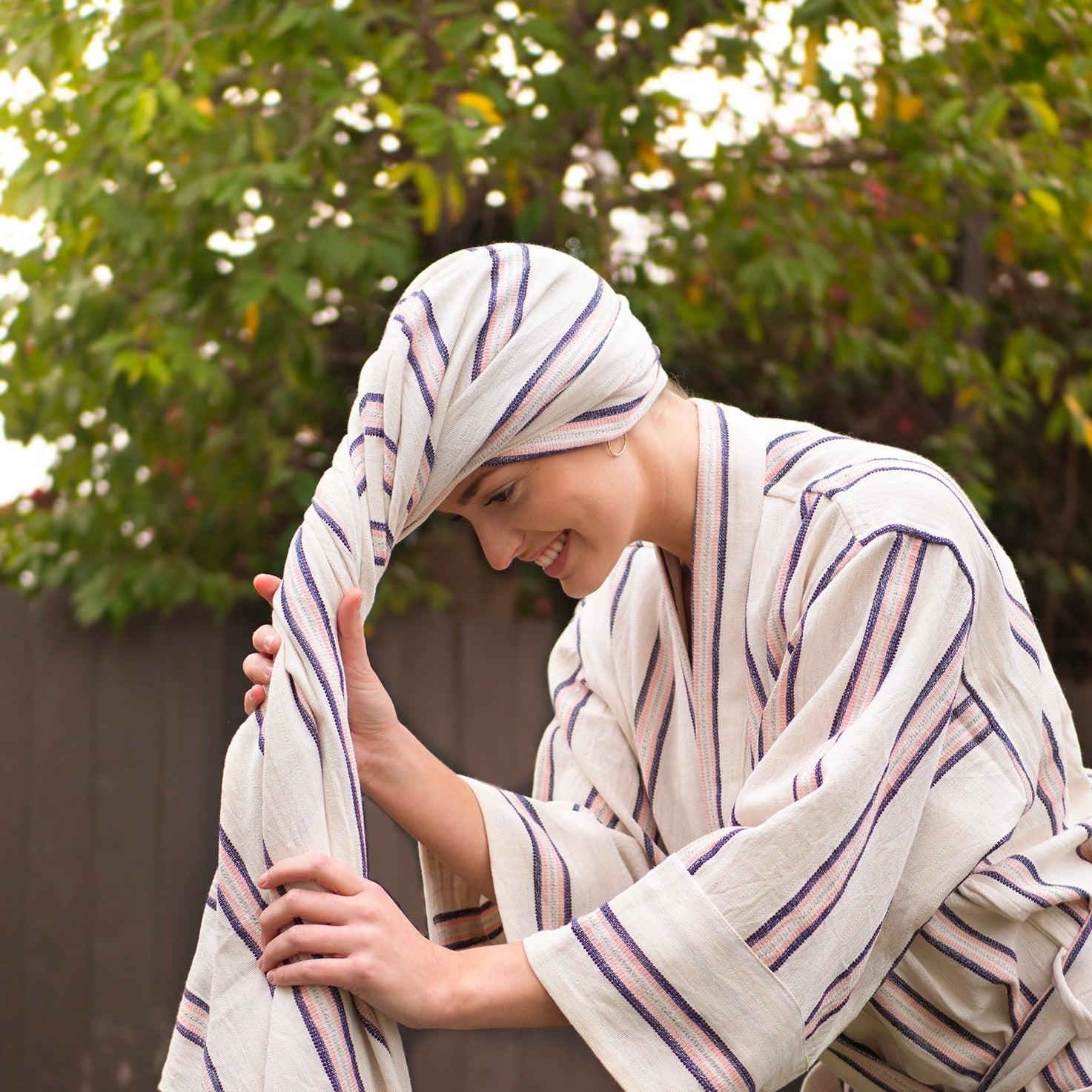 Cotton kimono and towel set with pink and navy stripes.